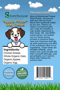 Storehouse Apple Fritter Dog Treats packaging with a cartoon dog, blue background, and grass at the bottom.