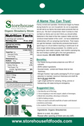 Nutrition facts label and product information for Storehouse Organic Strawberry Slices on a green background.